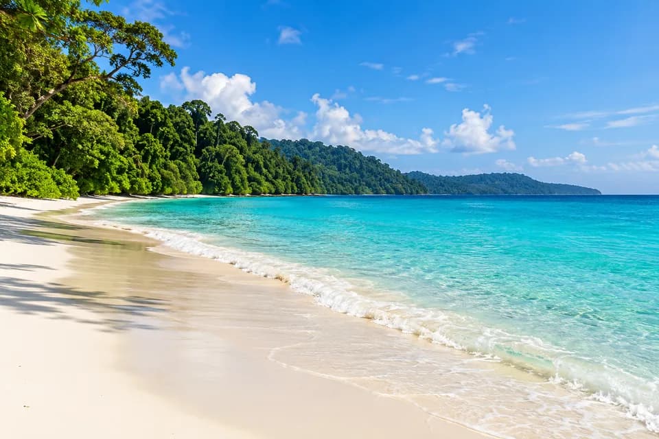 White sand and turquoise sea at Radhanagar Beach in the Andaman Islands